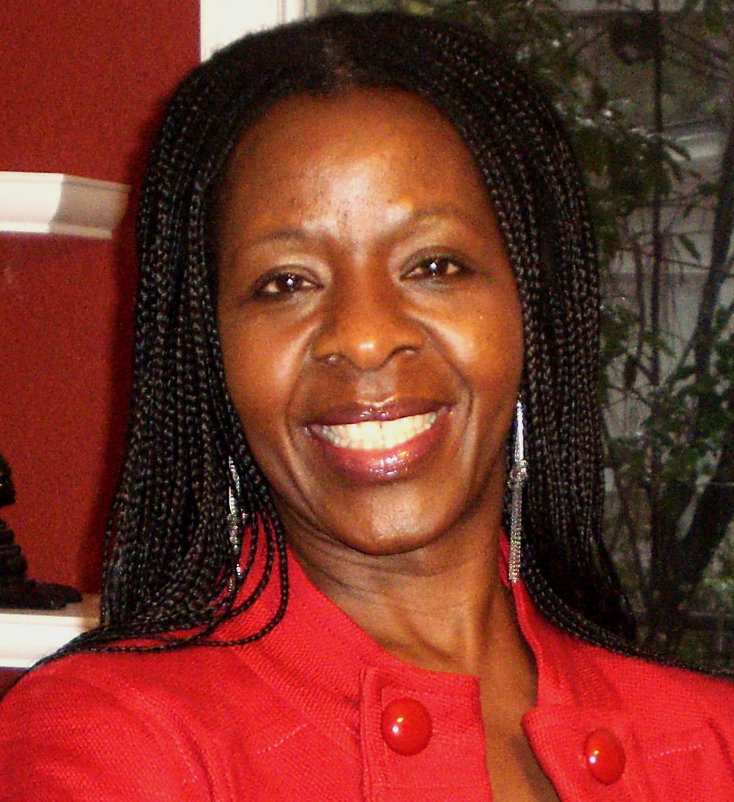 Professional headshot of Agness N. Leslie, Outreach Director and Master Lecturer