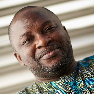 Professional headshot of Uwem Akpan